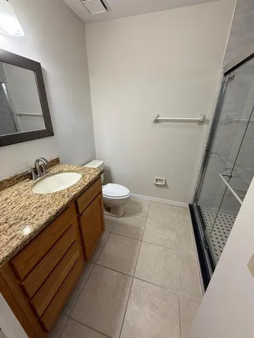 a kitchen with stainless steel appliances cabinets a sink and a window
