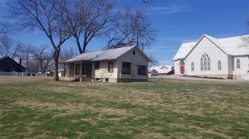 601 Main Street Blanket, TX 76432 - Photo 2 of 4 a view of a house with a yard
