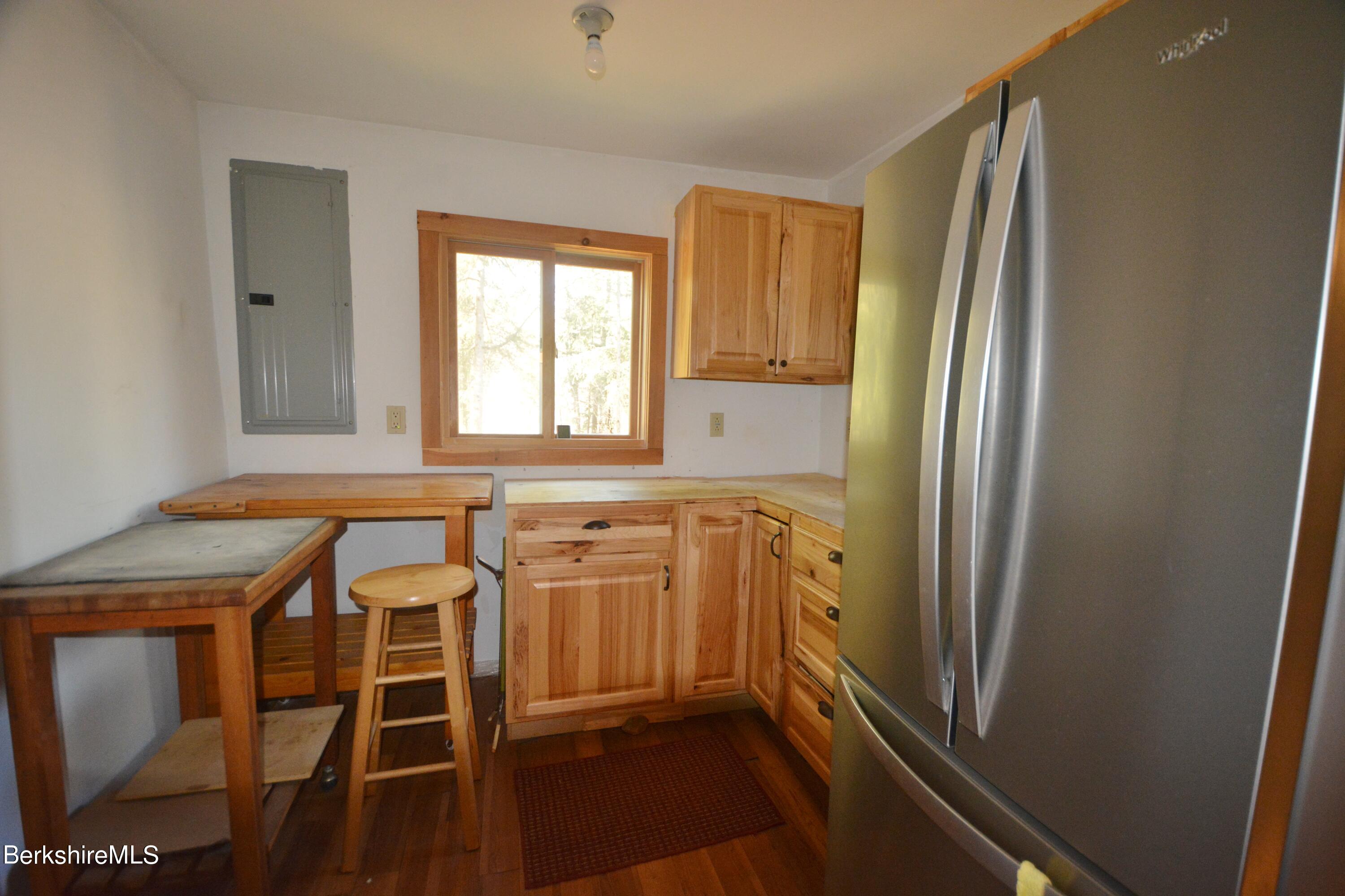 150 Cold Spring Road Sandisfield, MA 01255 - Photo 4 of 9 a view of a kitchen with a window