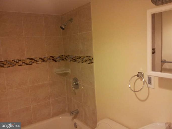 20 North Rosedale Street Baltimore, MD 21229 - Photo 2 of 15 a bathroom with a shower