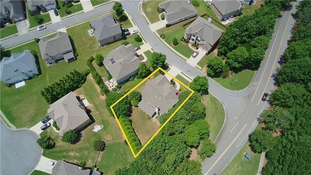2945 Links View Way Cumming, GA 30041 - Photo 25 of 25 an aerial view of a house with garden space and street view