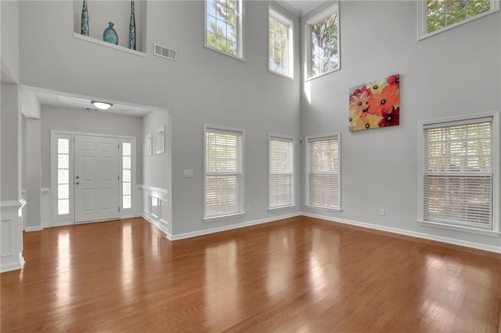 2945 Links View Way Cumming, GA 30041 - Photo 6 of 25 a view of an entryway with wooden floor