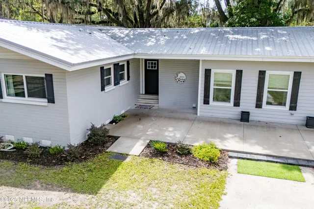 a house view with a outdoor space