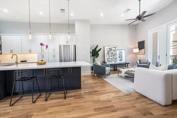 a kitchen with a sink and stove