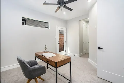 a living room with furniture and a table