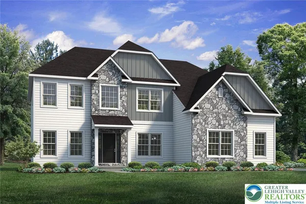 front view of a house with a yard