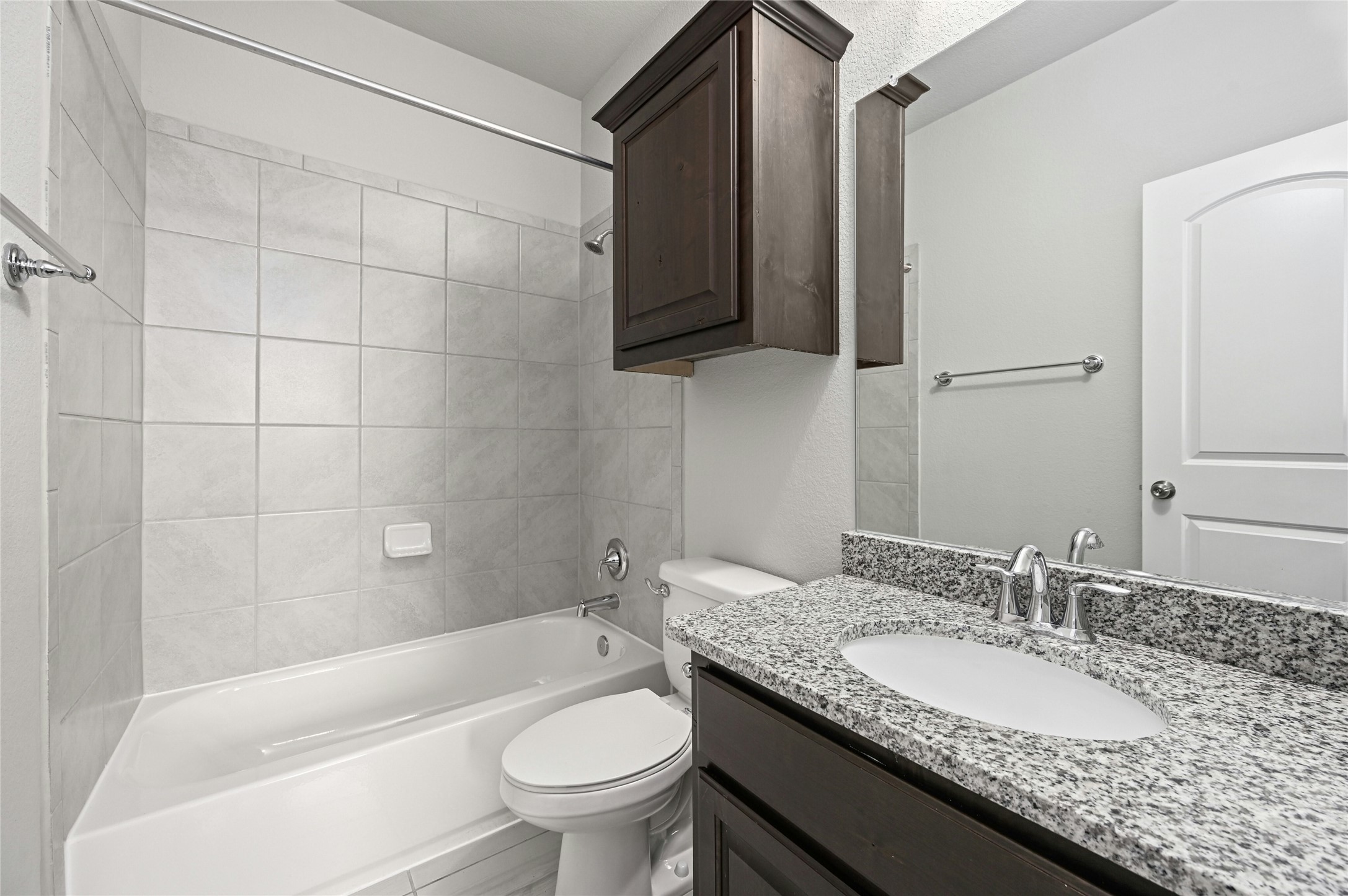 4124 Florentine Road Leander, TX 78641 - Photo 26 of 37 Full bathroom featuring toilet, tiled shower / bath, and vanity