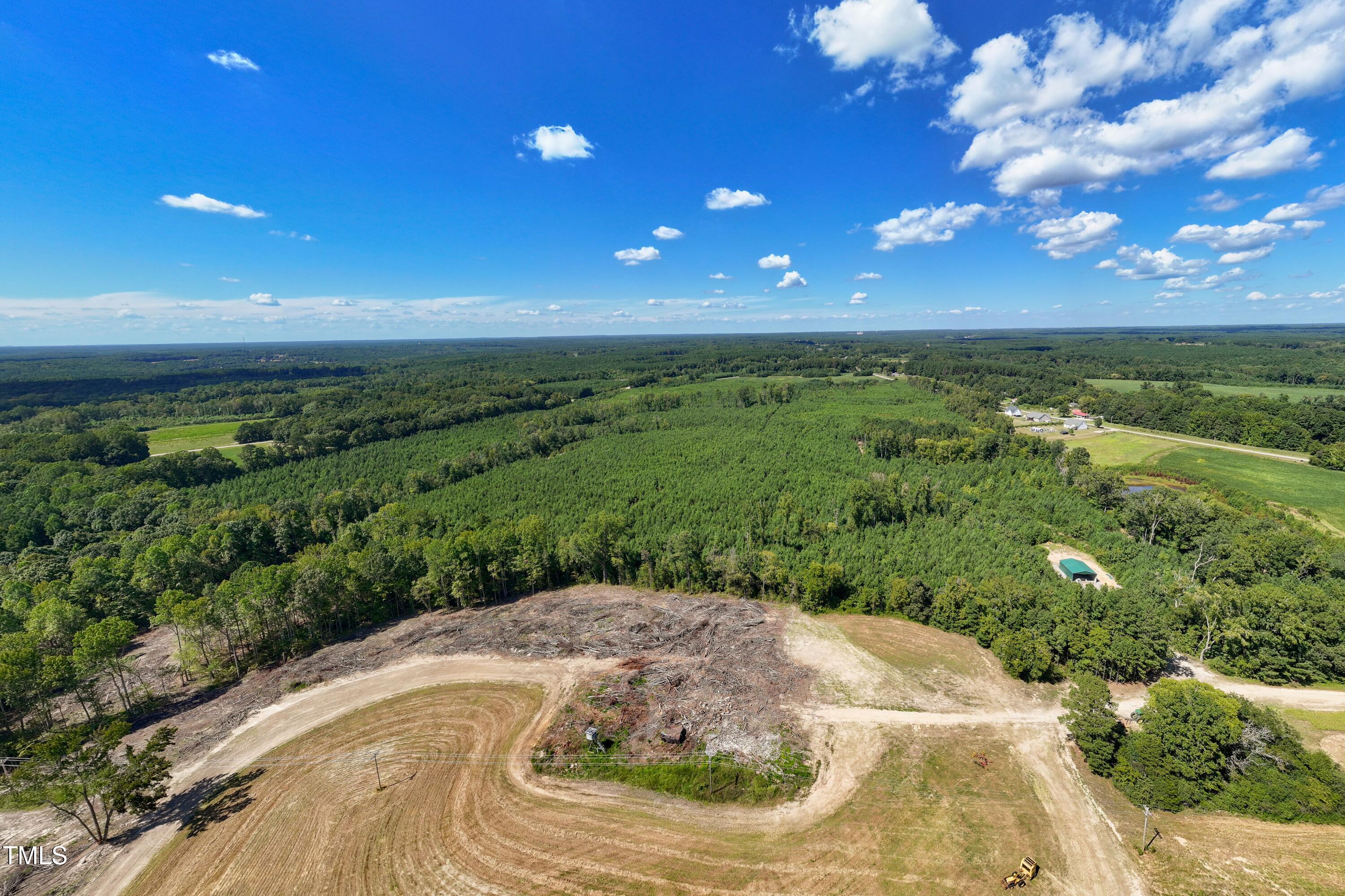 8 Julie McKnight Road Kittrell, NC 27544 - Photo 19 of 31 a view of a pathway both side of grassy field with shrub