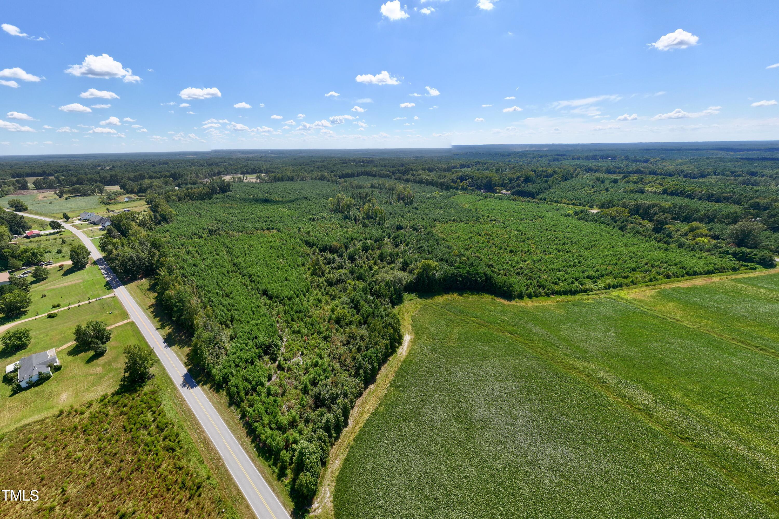 8 Julie McKnight Road Kittrell, NC 27544 - Photo 6 of 31 a view of a lush green space