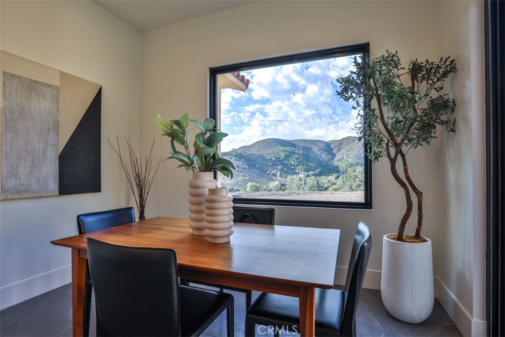 43698 De Luz Road Temecula, CA 92590 - Photo 13 of 60 a view of a dining room with furniture window and outside view