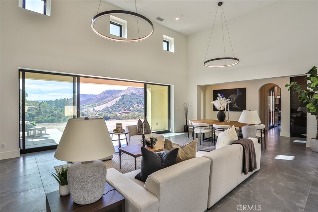 43698 De Luz Road Temecula, CA 92590 - Photo 20 of 60 a living room with furniture and a large window