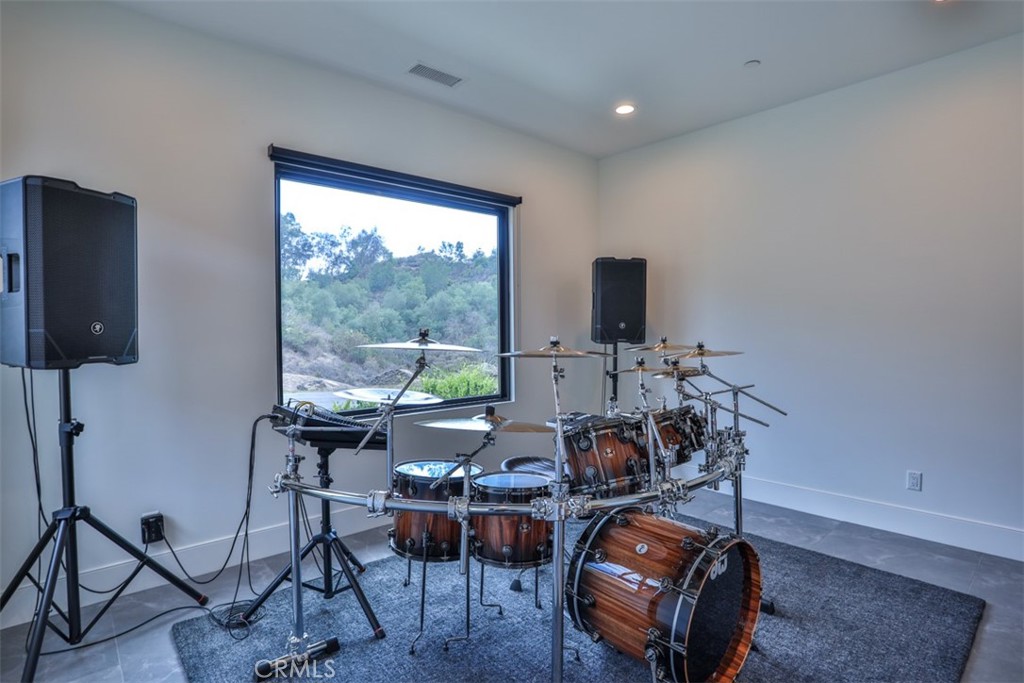 43698 De Luz Road Temecula, CA 92590 - Photo 47 of 60 a room with furniture