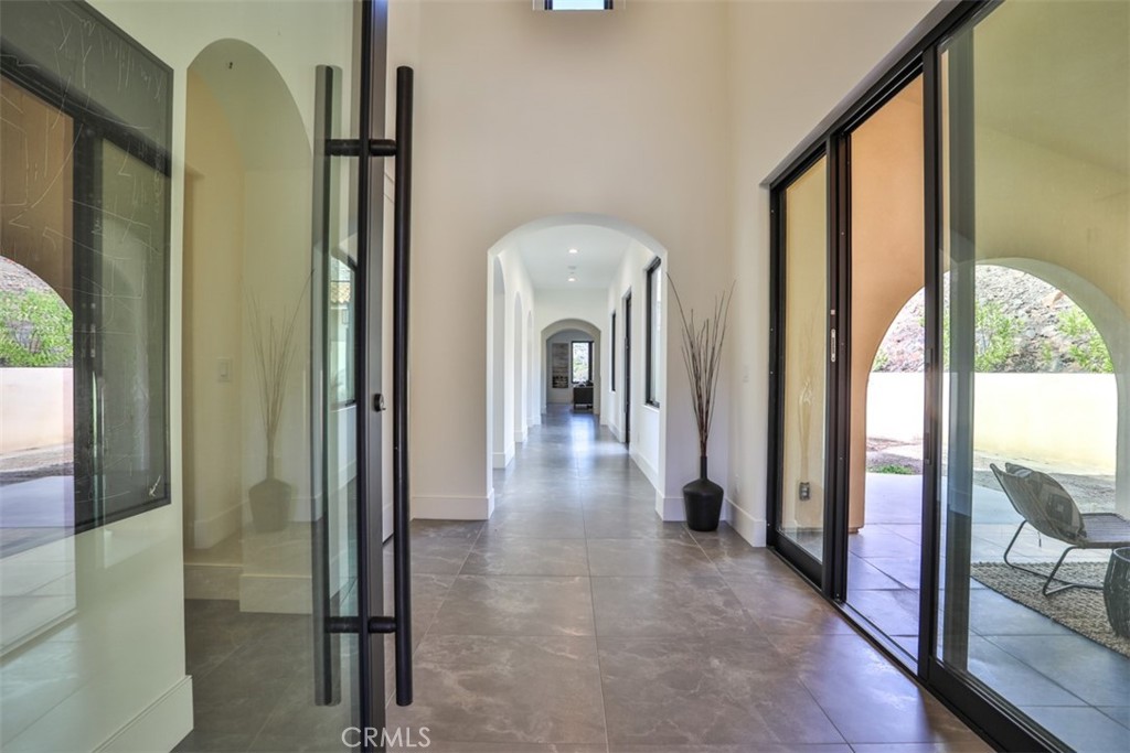 43698 De Luz Road Temecula, CA 92590 - Photo 5 of 60 a view of a hallway view with staircase