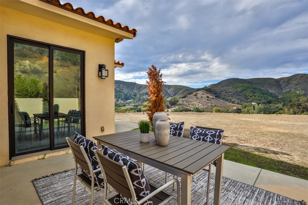 43698 De Luz Road Temecula, CA 92590 - Photo 53 of 60 a view of a terrace with furniture