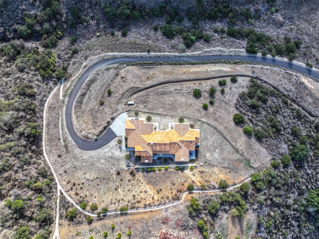 43698 De Luz Road Temecula, CA 92590 - Photo 59 of 60 a view of a swimming pool with a outdoor seating area