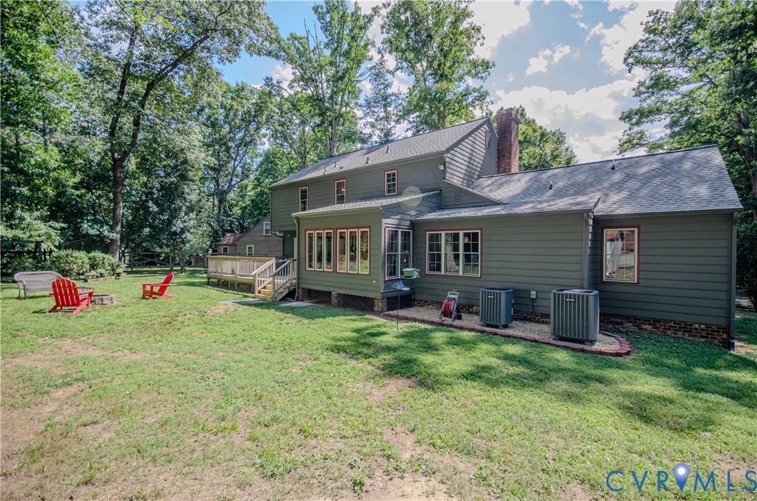 12500 Musical Lane Midlothian, VA 23113 - Photo 47 of 51 Rear exterior featuring a spacious lawn, wood deck