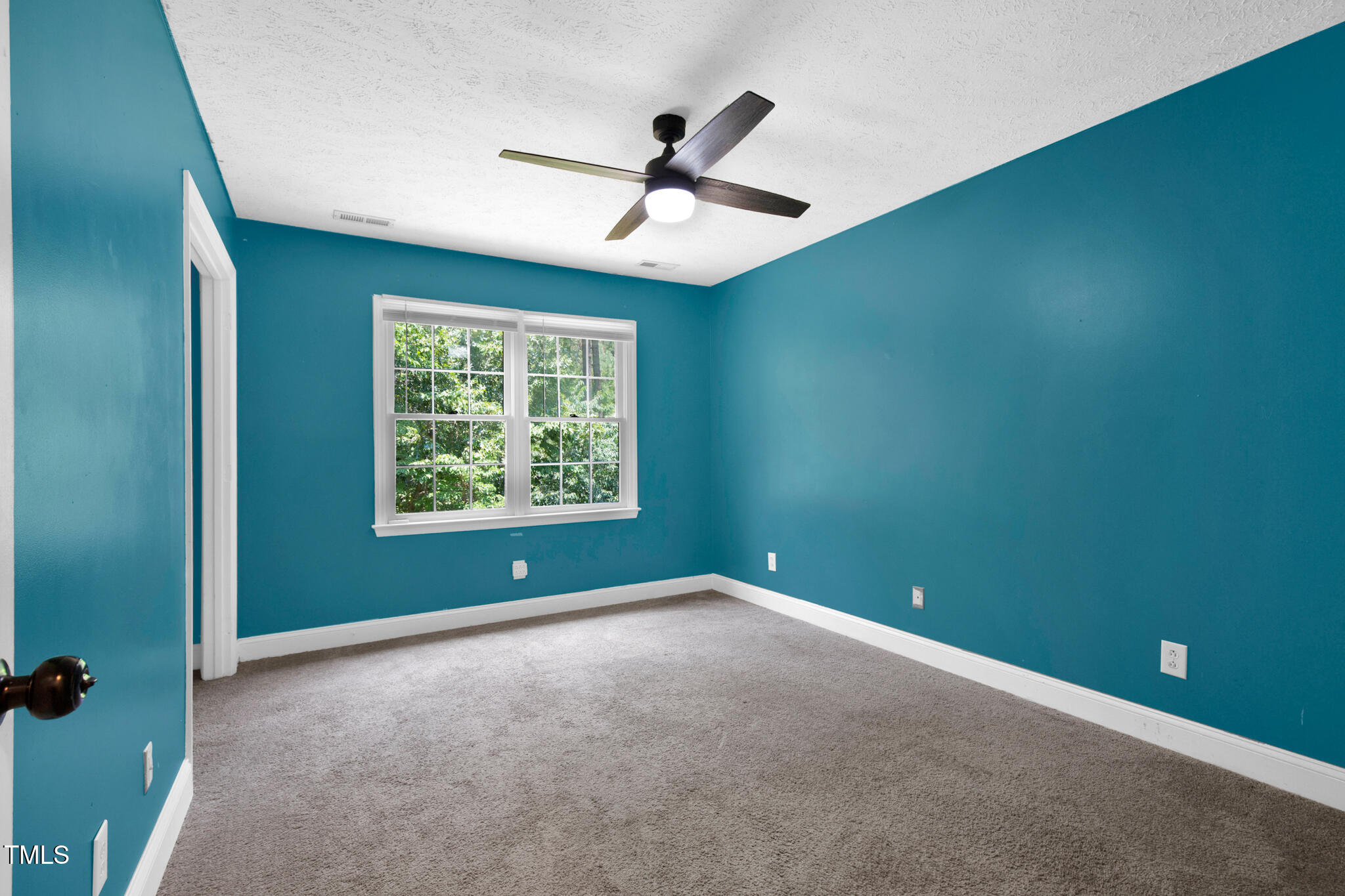 7832 Shuttle Road Fayetteville, NC 28311 - Photo 25 of 35 an empty room with ceiling fan and window