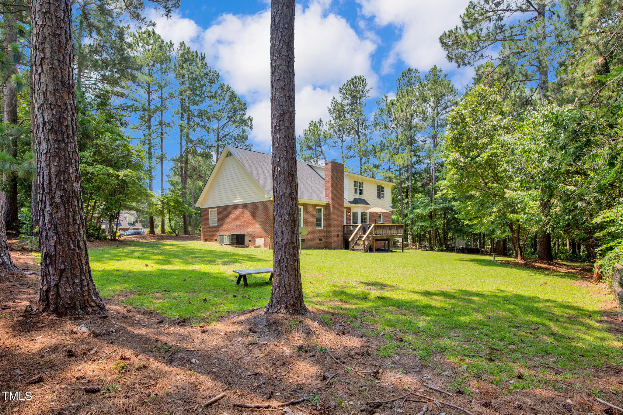 7832 Shuttle Road Fayetteville, NC 28311 - Photo 32 of 35 a view of a house with a yard