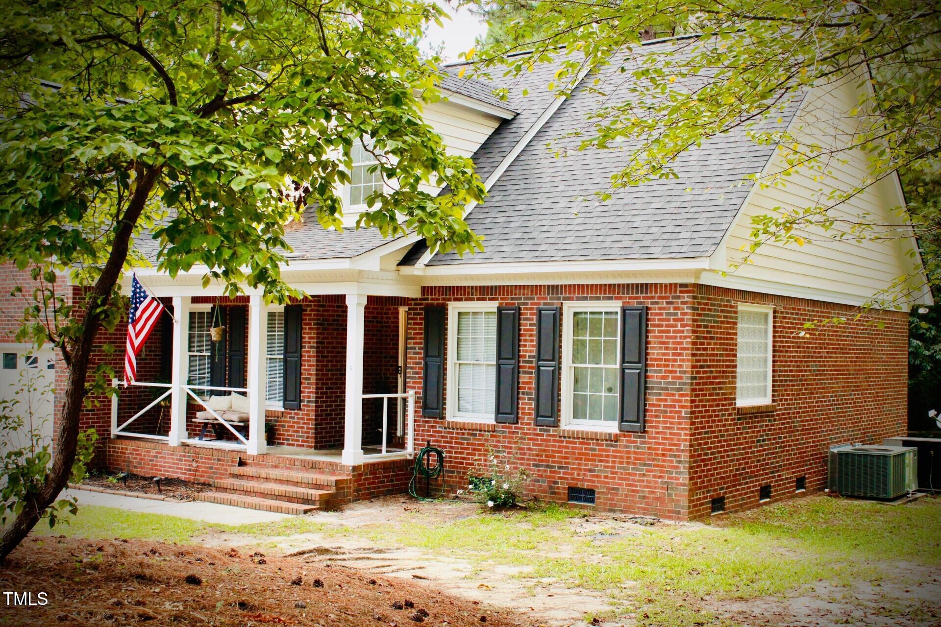 7832 Shuttle Road Fayetteville, NC 28311 - Photo 35 of 35 front view of a house with a yard