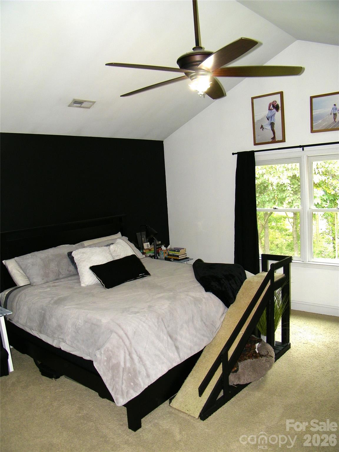 609 Redah Avenue Locust, NC 28097 - Photo 12 of 37 a bedroom with a bed and a large window
