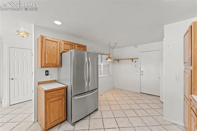 a kitchen with a cabinets and appliances