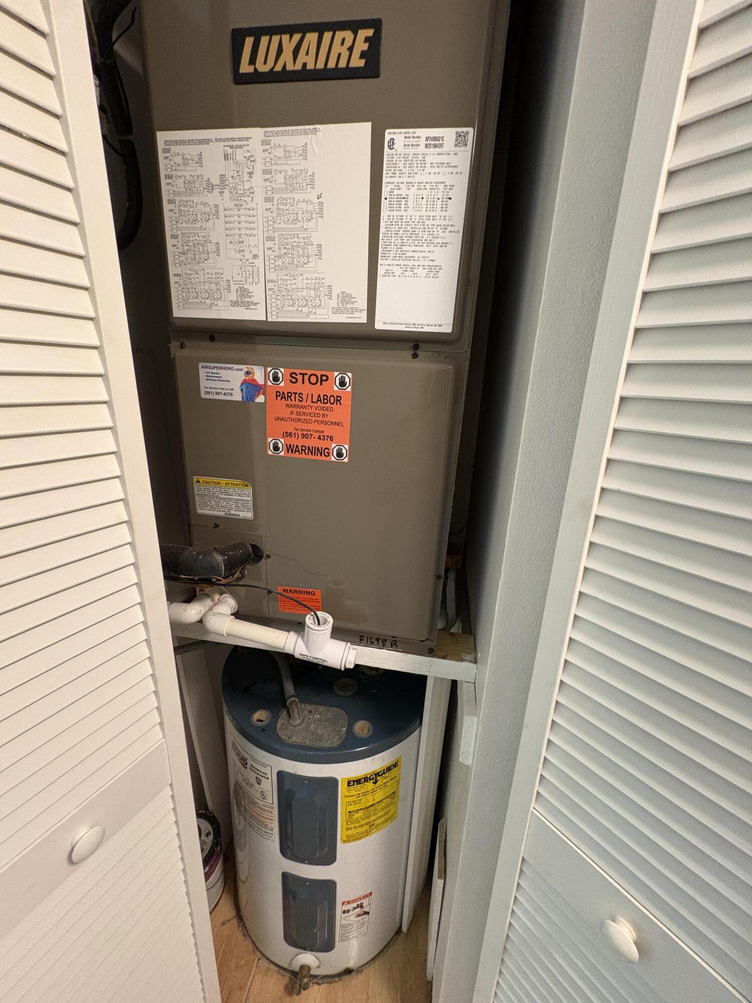 102 Stratford H, Unit A West Palm Beach, FL 33417 - Photo 7 of 19 a bathroom with a sink and a mirror