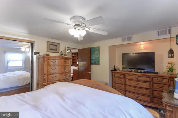 a bathroom with a toilet and a sink