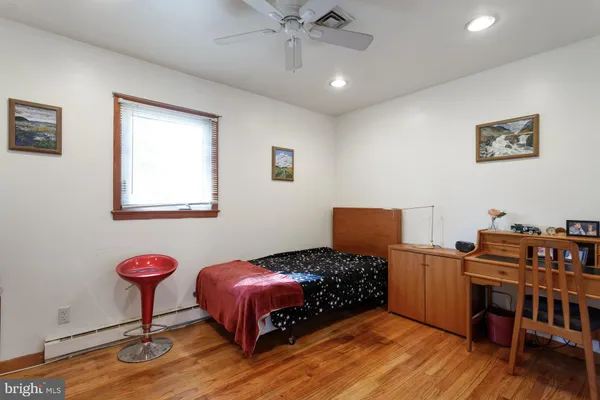 a bedroom with a bed and a closet