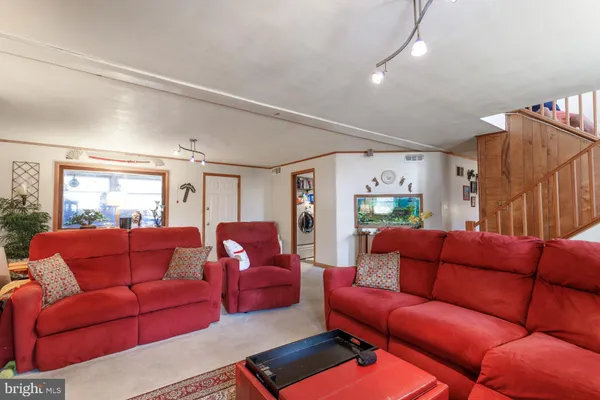 a living room with furniture and a couch