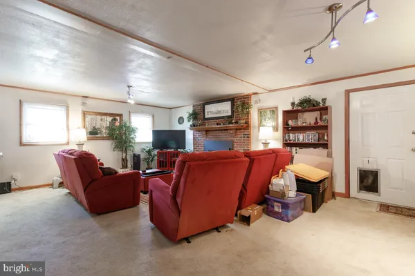 a living room with furniture and a couch