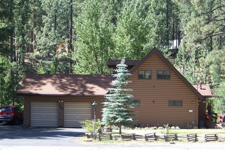 760 Hot Springs Road Markleeville, CA 96120 - Photo 4 of 28 a view of a house with a yard