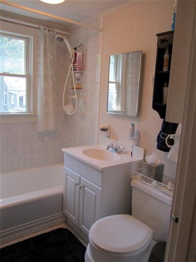 79 Earle Road West Harwich, MA 02671 - Photo 15 of 30 a bathroom with a sink a toilet a mirror and shower