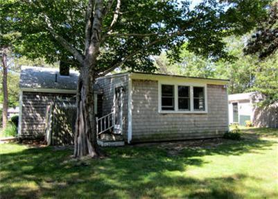 79 Earle Road West Harwich, MA 02671 - Photo 22 of 30 a view of a house with a yard