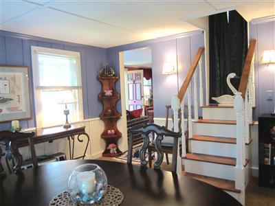 79 Earle Road West Harwich, MA 02671 - Photo 6 of 30 a living room with table chairs and a window