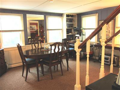 79 Earle Road West Harwich, MA 02671 - Photo 7 of 30 a view of a dining room with furniture window and wooden floor