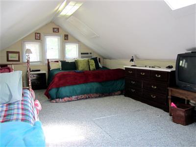 79 Earle Road West Harwich, MA 02671 - Photo 9 of 30 a bedroom with bed and window