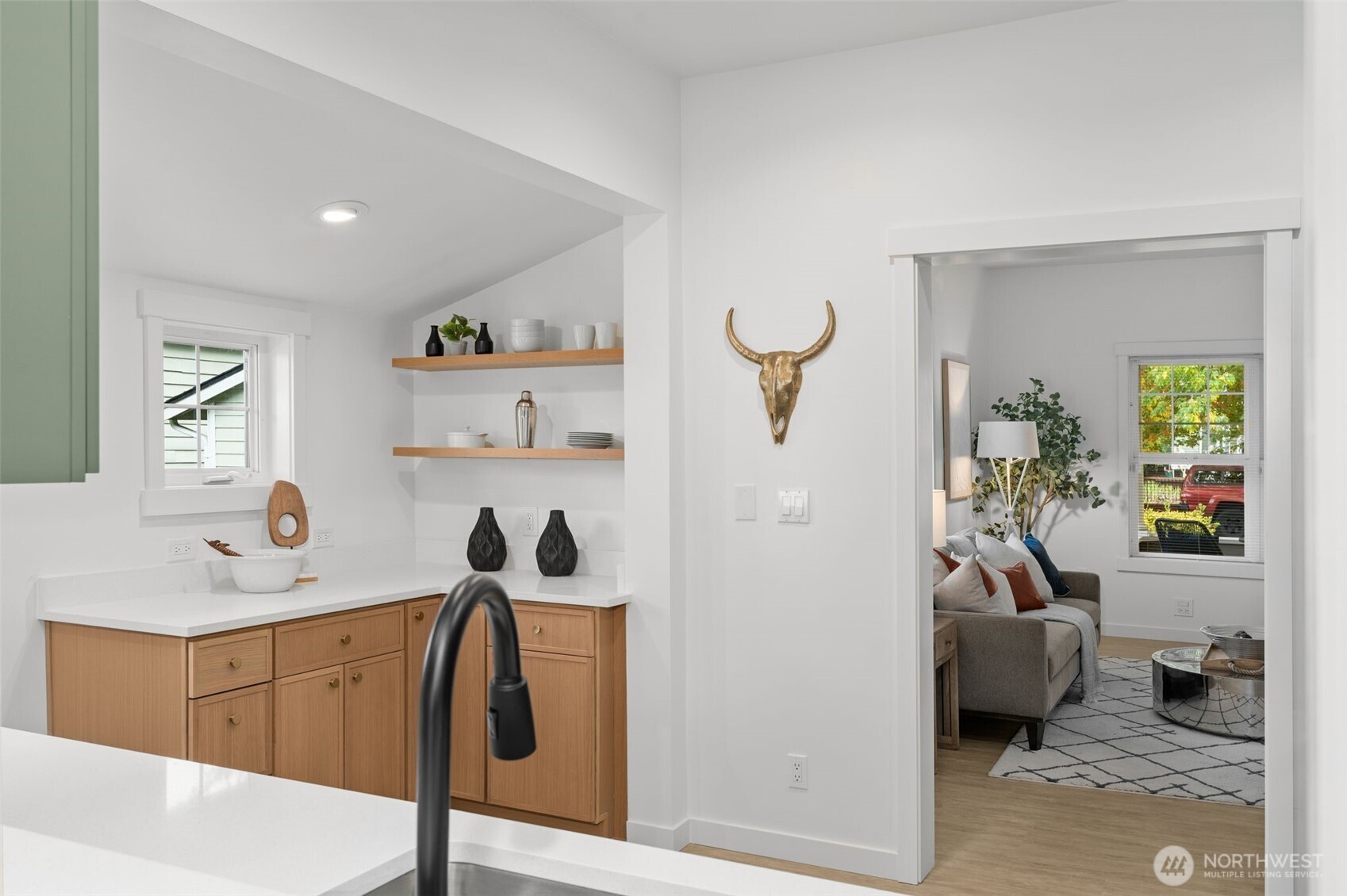 6507 41st Avenue Southwest Seattle, WA 98136 - Photo 11 of 37 a view of a kitchen center island and furniture