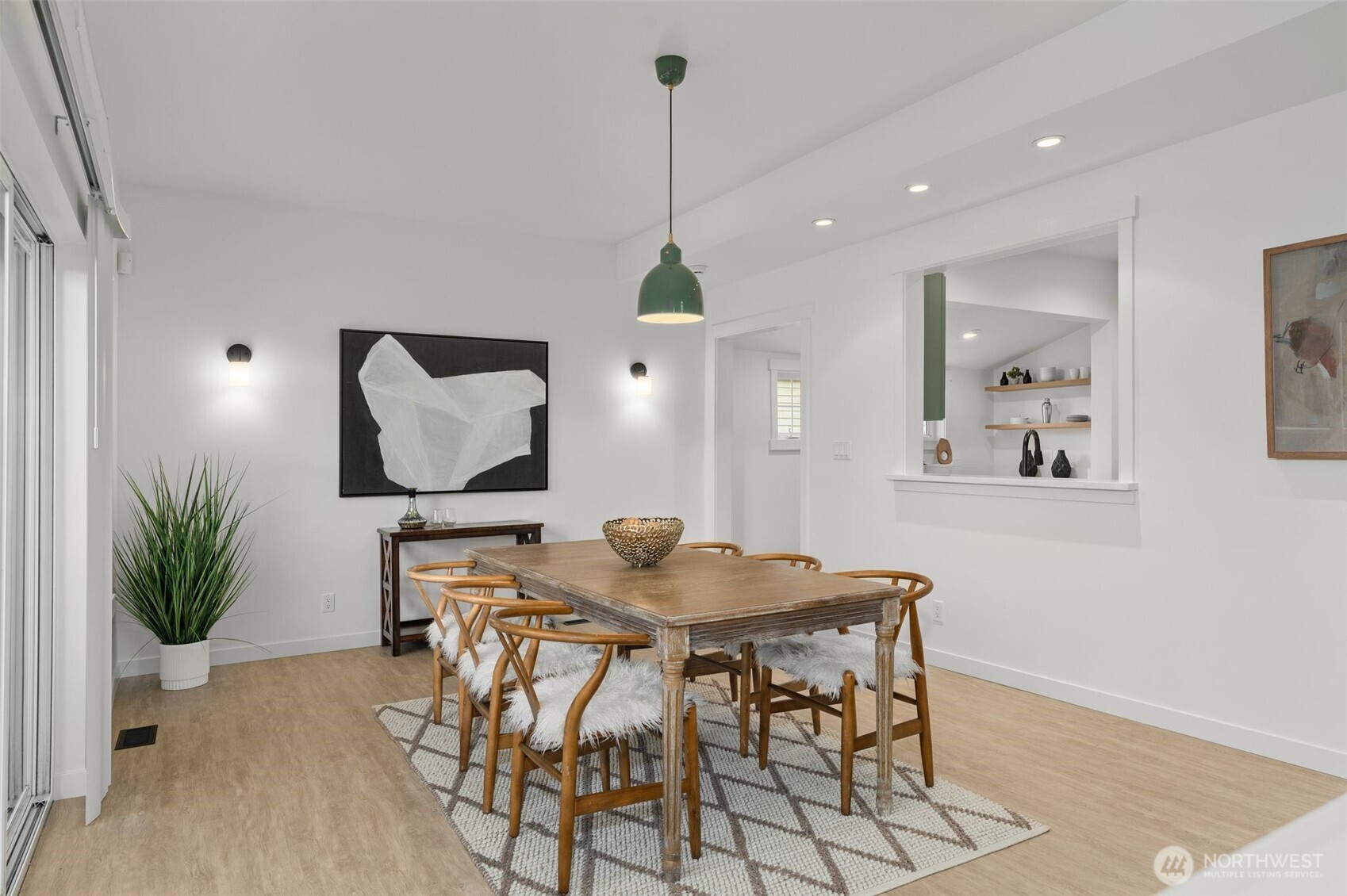 6507 41st Avenue Southwest Seattle, WA 98136 - Photo 12 of 37 a dining room with furniture and window