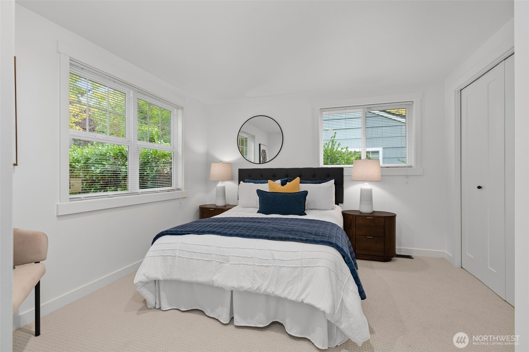 6507 41st Avenue Southwest Seattle, WA 98136 - Photo 19 of 37 a bedroom with a bed and window