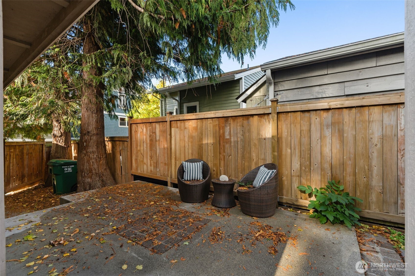 6507 41st Avenue Southwest Seattle, WA 98136 - Photo 28 of 37 a view of backyard with outdoor seating and plants