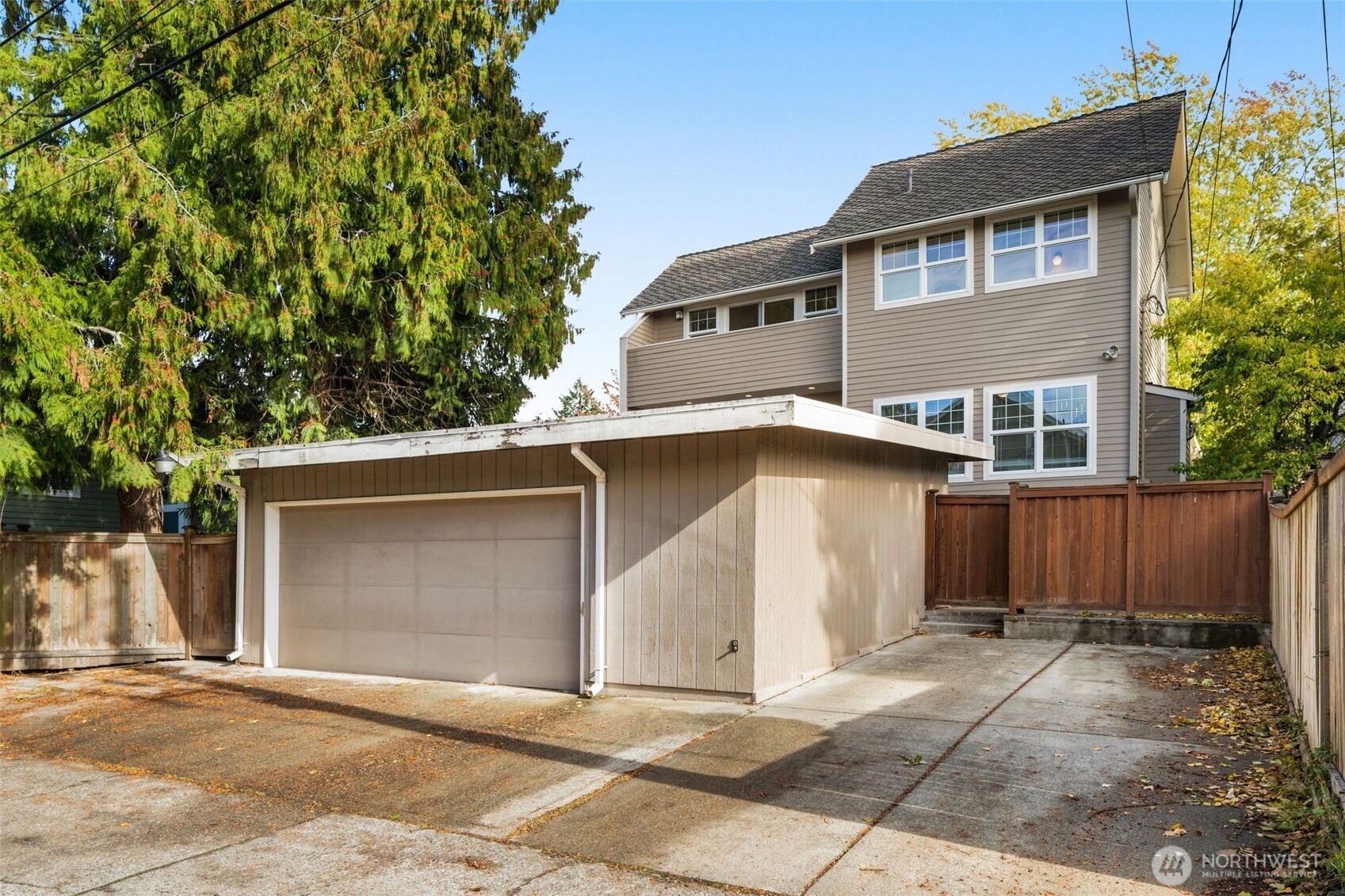 6507 41st Avenue Southwest Seattle, WA 98136 - Photo 31 of 37 a front view of a house with a garage