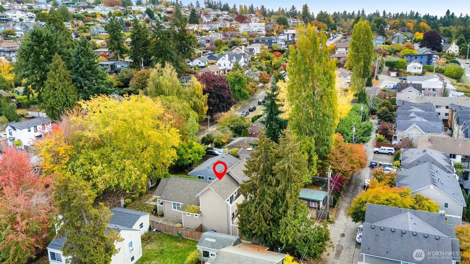 6507 41st Avenue Southwest Seattle, WA 98136 - Photo 36 of 37 an aerial view of residential houses with outdoor space