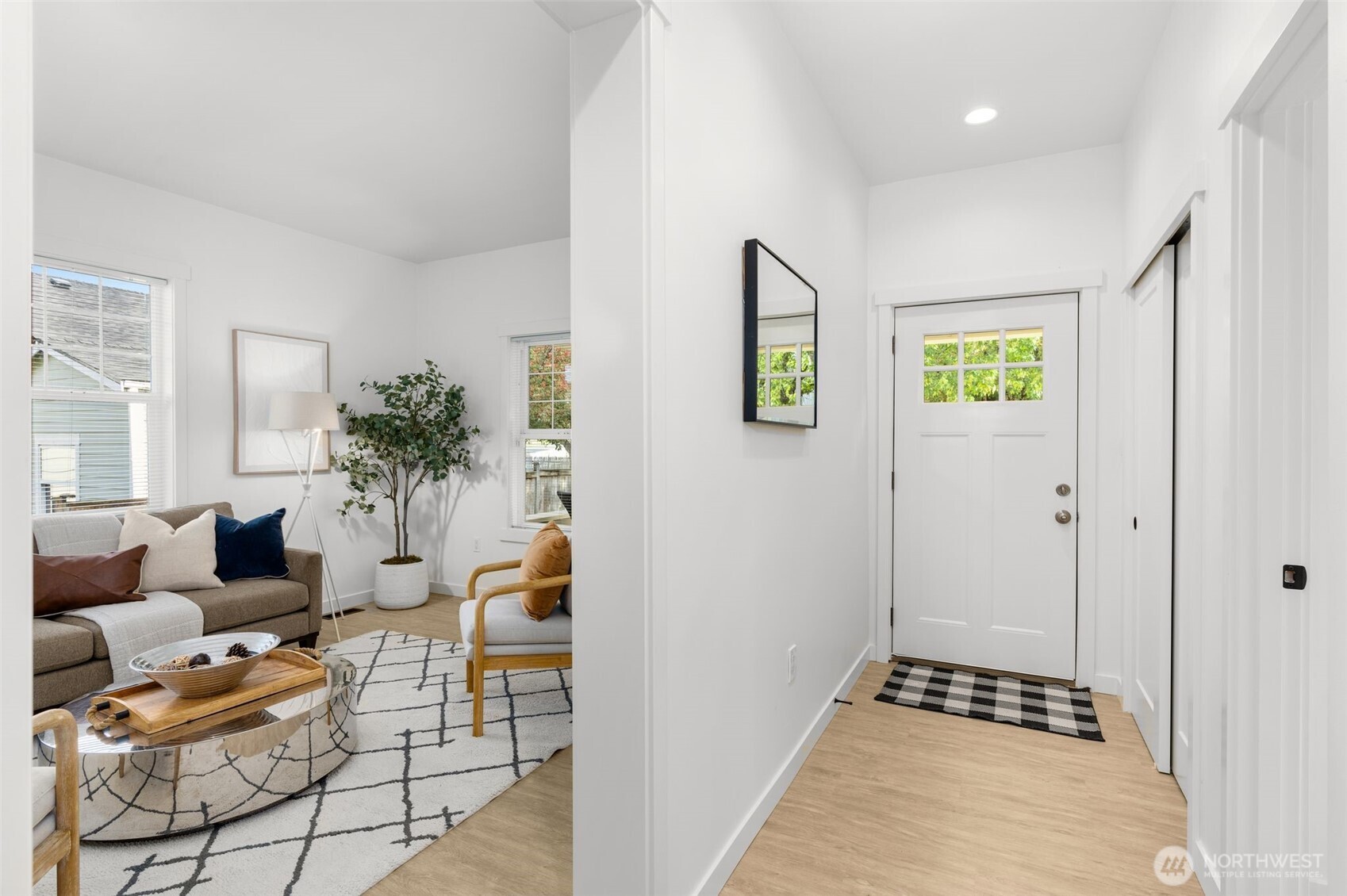 6507 41st Avenue Southwest Seattle, WA 98136 - Photo 5 of 37 a living room with furniture and wooden floor