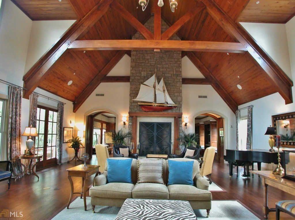 5813 Lighthouse Way Gainesville, GA 30506 - Photo 23 of 49 a living room with fireplace furniture and a large window