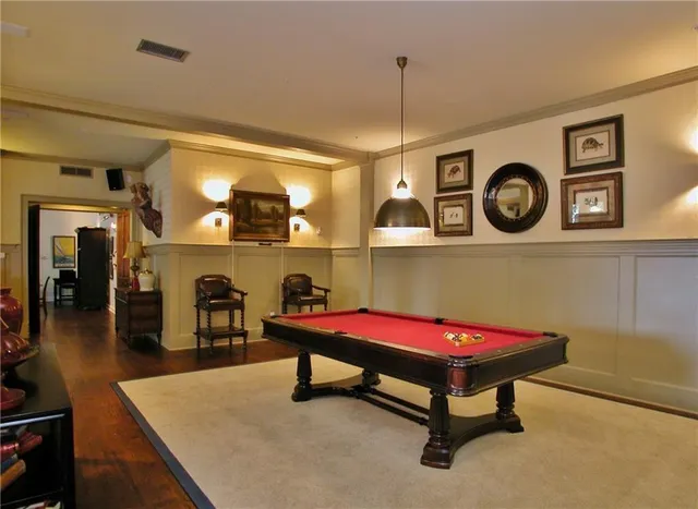 a living room with furniture and a table