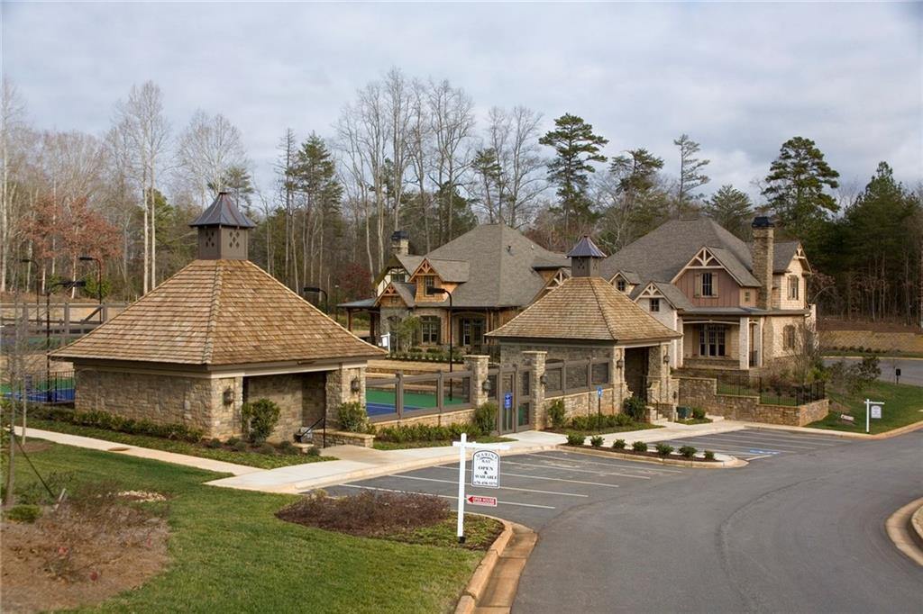 5813 Lighthouse Way Gainesville, GA 30506 - Photo 46 of 49 a front view of a house with swimming pool and sitting area