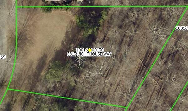 5813 Lighthouse Way Gainesville, GA 30506 - Photo 5 of 49 a sign that is on the side of the building