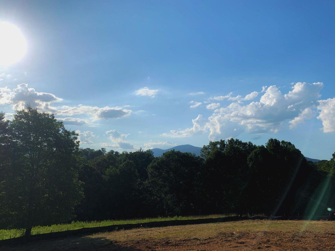 Lot 9 Cahas Summit Road Boones Mill, VA 24065 - Photo 3 of 18 a view of a lake in middle of sunset
