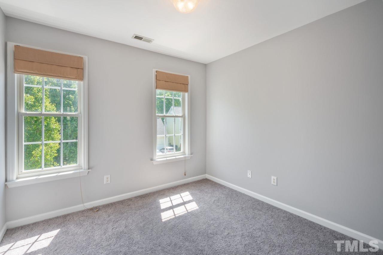 2133 Haig Point Way Raleigh, NC 27604 - Photo 17 of 28 a view of an empty room with a window