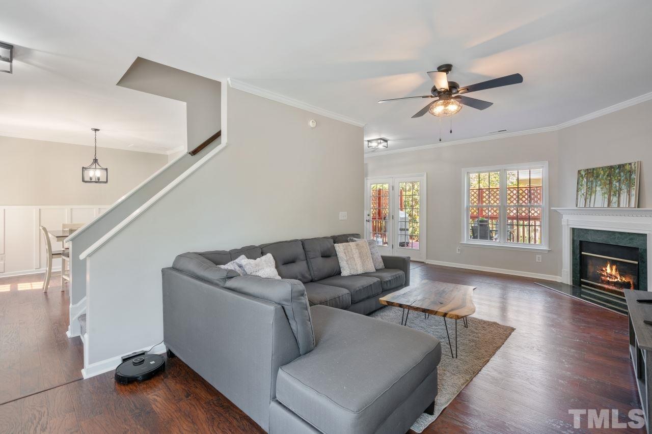 2133 Haig Point Way Raleigh, NC 27604 - Photo 6 of 28 a living room with furniture and a fireplace